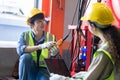 Team engineer technical department working in power plant control panel of industry factory. male professional system electrician Royalty Free Stock Photo