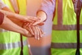 Team engineering and foreman connect joining hands together, Stack of hands. Royalty Free Stock Photo