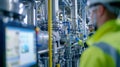 A team of engineers inspecting a biofuel plant checking the system that filters and purifies the syngas before it is