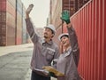 A team of engineers waving hand to say hello, greeting someone