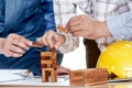 Team engineers working with construction tools on table