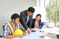 Team engineers working meeting room at the office. Team workers are talking construction plan. Electricians carpenter or Technical Royalty Free Stock Photo