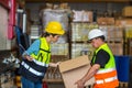 Team Foreman or Team worker working in warehouse. Industrial and industrial workers concept. worker woman order details and checki