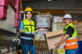 Team Foreman or Team worker working in warehouse. Industrial and industrial workers concept. worker woman order details and checki