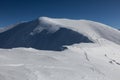 A team of free-riders climbs together into snowy mountains. Marmaros range, The Carpathian mountains Royalty Free Stock Photo