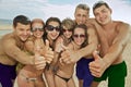 Team of friends having fun at the beach Royalty Free Stock Photo