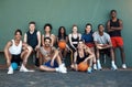 A team full of talent. Portrait of a group of sporty young people taking a break after a game of basketball.