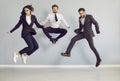 Team of funny, happy, crazy business people jumping and having fun in the office Royalty Free Stock Photo