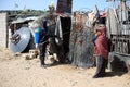 Team of global medicine wearing protective masks cleans carry out disinfections works at the Nahr el-Bared camp, in Gaza Strip