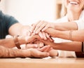 Team hands in support and unity with diversity group of businesspeople in meeting in office. Motivation, trust and Royalty Free Stock Photo