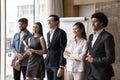 Team of happy diverse young business professional colleagues standing together Royalty Free Stock Photo