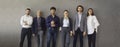 Banner with group portrait of successful business professionals leaning on grey wall Royalty Free Stock Photo