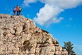 Team of hikers on the rocky summit Royalty Free Stock Photo