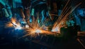 Team industrial robots are welding car part Royalty Free Stock Photo