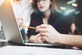 Close-up photo young businesspeople working on a new startup project in a modern loft office. Royalty Free Stock Photo