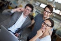 Team, laptop and portrait in office with laughing, cheerful and happy for company as colleagues. Businesspeople, group Royalty Free Stock Photo