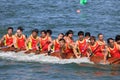 Team of male atheletes on dragonboat