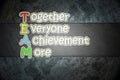 Team meaning written on blackboard background, high Royalty Free Stock Photo