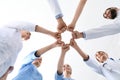 Team of medical doctors putting hands together on white Royalty Free Stock Photo