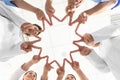 Team of medical workers holding hands together in hospital, bottom view Royalty Free Stock Photo