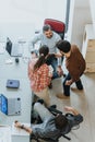 Team meeting discussion with laptops and documents in modern office. Royalty Free Stock Photo