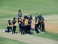 Team meeting, Drinks Break in Cricket. Royalty Free Stock Photo