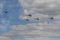 Team of MI-2 Helicopters Performing Elements in Air In Front of Spectators During Aviation Sport Event Royalty Free Stock Photo