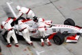 Team Monaco mechanics pushing car back