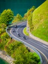 A team of motorcyclists travels the beautiful roads in the summer. The road and the turns. Traveling on a motorcycle.