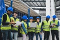 Team of multiracial engineers working in robotic factory Royalty Free Stock Photo