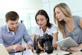 Team of photo reporters working at office Royalty Free Stock Photo
