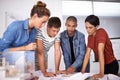 Team, planning and architects with blueprint for discussion, construction or serious people in creative startup Royalty Free Stock Photo