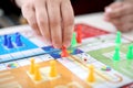 Team playing ludo board game