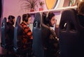 A team of professional cyber sportmans, trains for the championship, plays in a multiplayer video game on pc in a gaming Royalty Free Stock Photo