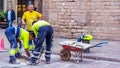 Team of professional male workers on constuction site