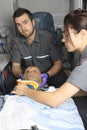 Team of professional paramedics giving unconscious