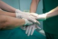 A team of professional surgeons work together in the operating room