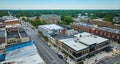 Team Quality Services building aerial with downtown Auburn courthouse