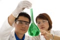 Team of Researchers holding flask with chemicals