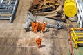 A team of rigger lifting an anchor from a construction work barge