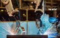 Team robots are welding part in car factory Royalty Free Stock Photo
