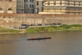 Team of rowers train in a boat in Florence, Italy.