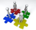 Team on separate jigsaw puzzle pieces Royalty Free Stock Photo