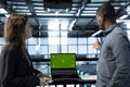 Team of server farm engineers using isolated screen mockup laptop Royalty Free Stock Photo