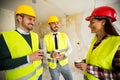 Team of smiling architects at coffee break Royalty Free Stock Photo