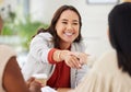 Team of smiling diverse business women shaking hands in office after meeting in boardroom. Group of happy professionals Royalty Free Stock Photo