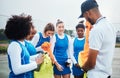 Team, soccer and women football coach at training, fitness and workout on the field or sport ground for practice. Match Royalty Free Stock Photo