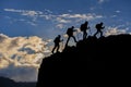 Successful climber & hiking group silhouette