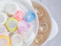 Team sterilizer and dryer sterilize baby accessories. Royalty Free Stock Photo