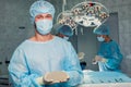 Team surgeon at work in operating room. breast Royalty Free Stock Photo
